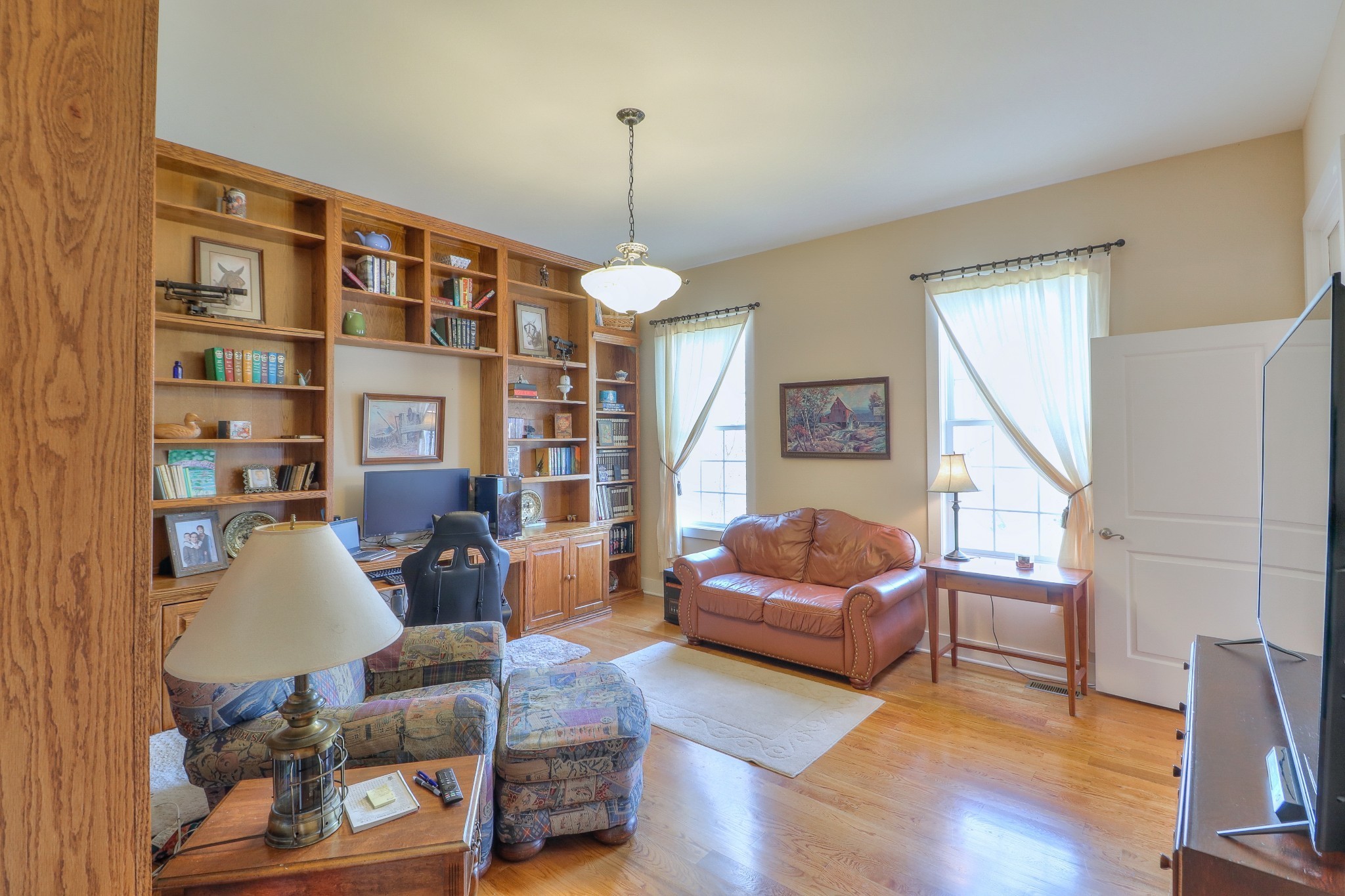 1298 Berea Church Road Lebanon, TN 37087 - Photo 20 of 50 a living room with furniture a window and a wooden floor