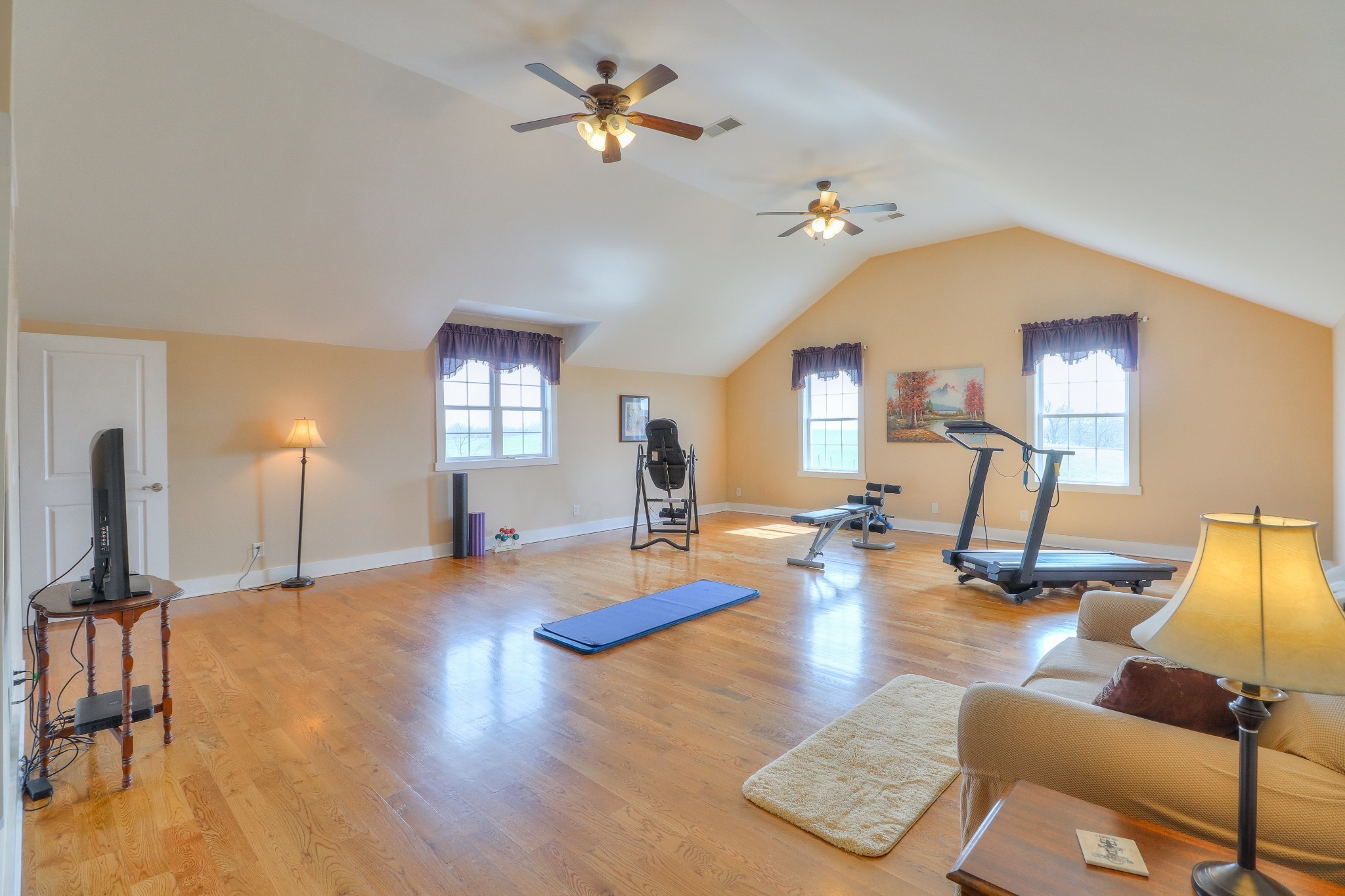 1298 Berea Church Road Lebanon, TN 37087 - Photo 21 of 50 a living room with kitchen view and a chandelier