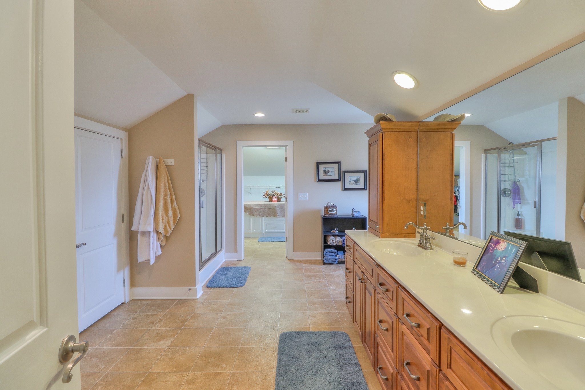 1298 Berea Church Road Lebanon, TN 37087 - Photo 24 of 50 a bathroom with a sink double vanity mirror and a bathtub