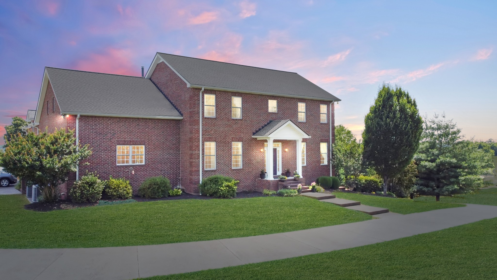 1298 Berea Church Road Lebanon, TN 37087 - Photo 3 of 50 a front view of a house with a yard and potted plants
