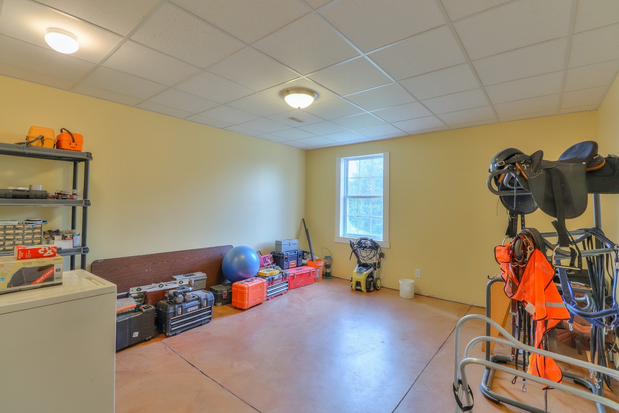 1298 Berea Church Road Lebanon, TN 37087 - Photo 38 of 50 a bedroom with furniture and a gym equipment