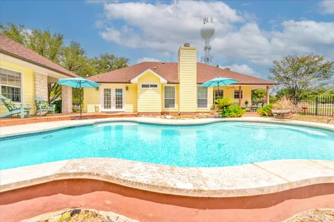 $575,000 | 18609 Venture Drive, Point Venture, TX 78645