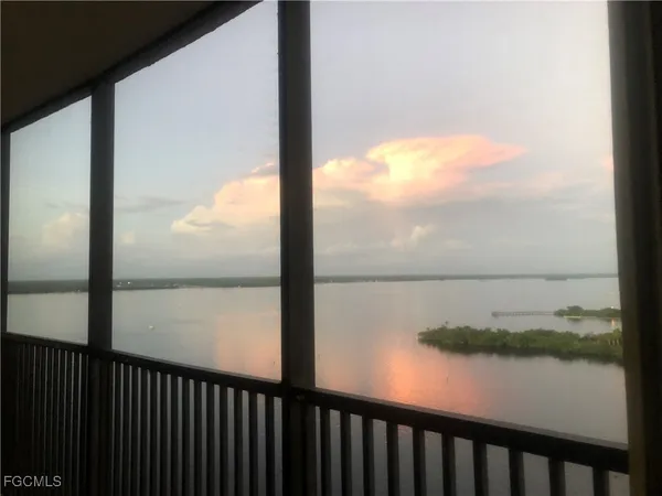 a view of a lake from a balcony