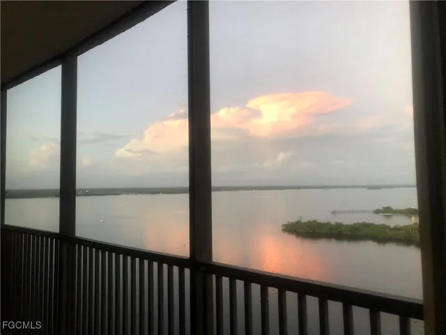 a view of a lake from a balcony