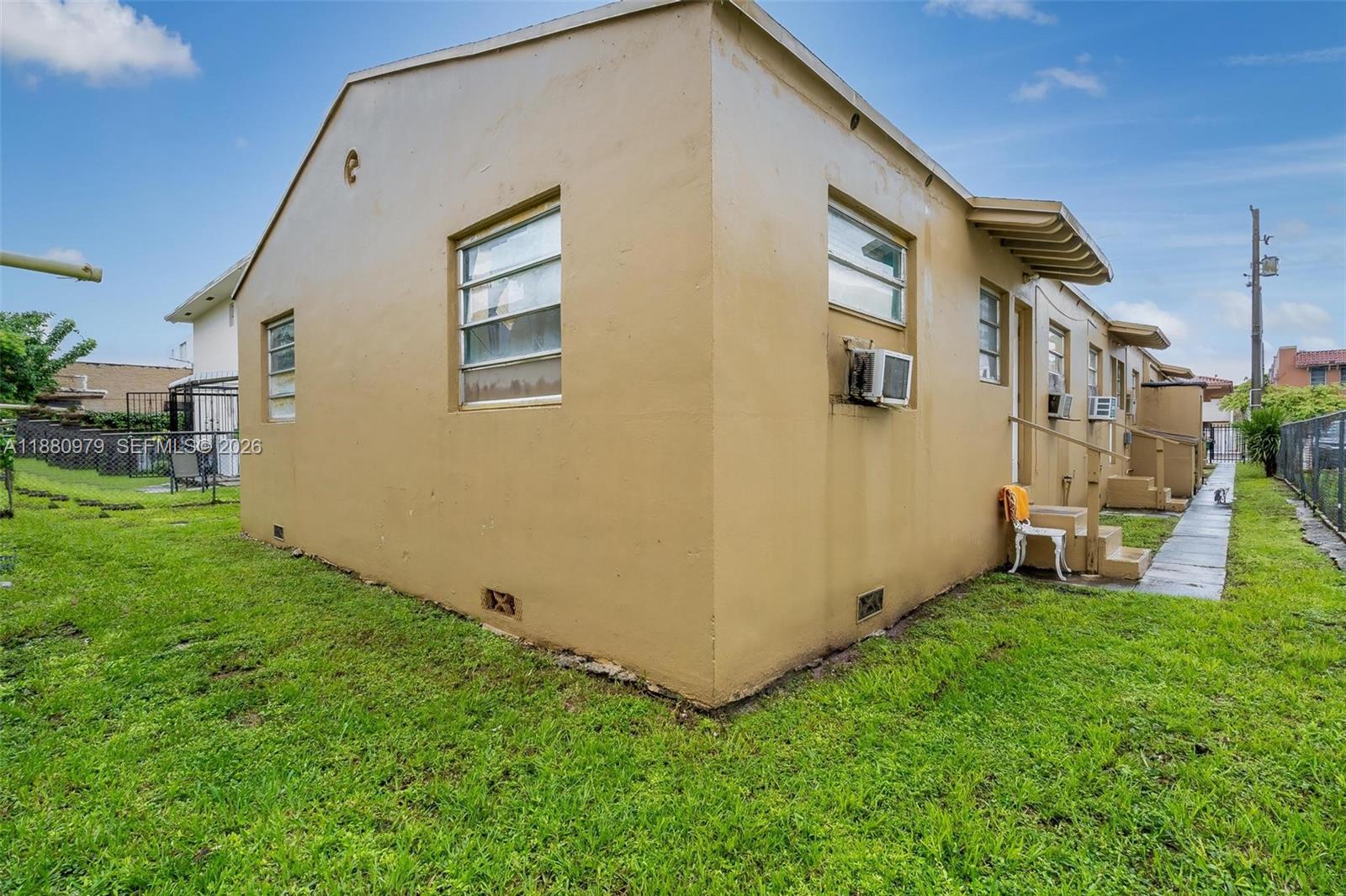 1345 Southwest 7th Street Miami, FL 33135 - Photo 21 of 37 a view of backyard with barbeque grill and stairs