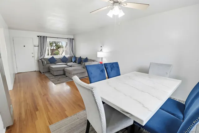 a bed room with a bed and a chandelier