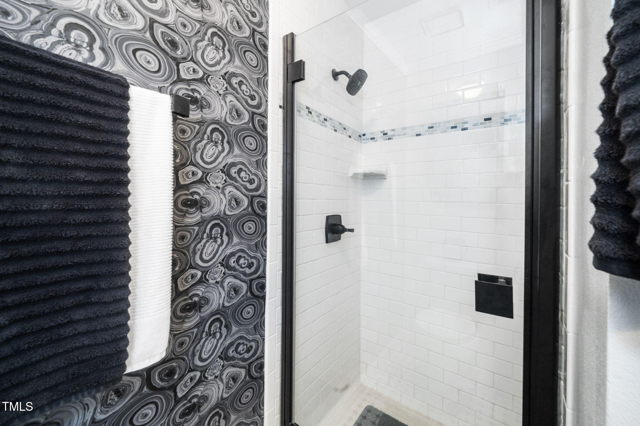 7704 Falcon Rest Circle Raleigh, NC 27615 - Photo 19 of 23 a bathroom with a shower