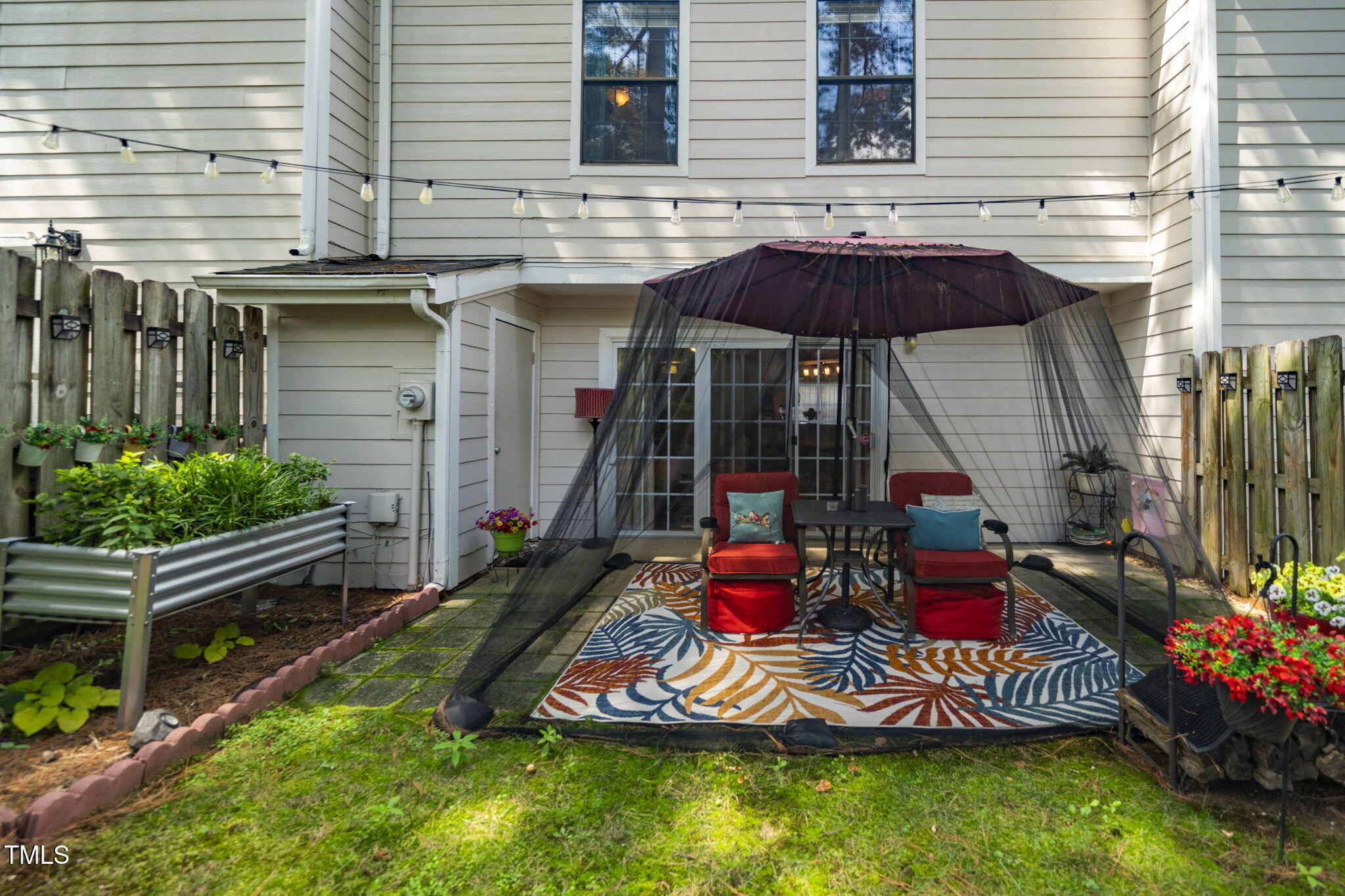 7704 Falcon Rest Circle Raleigh, NC 27615 - Photo 21 of 23 a view of outdoor space with seating area and barbeque oven