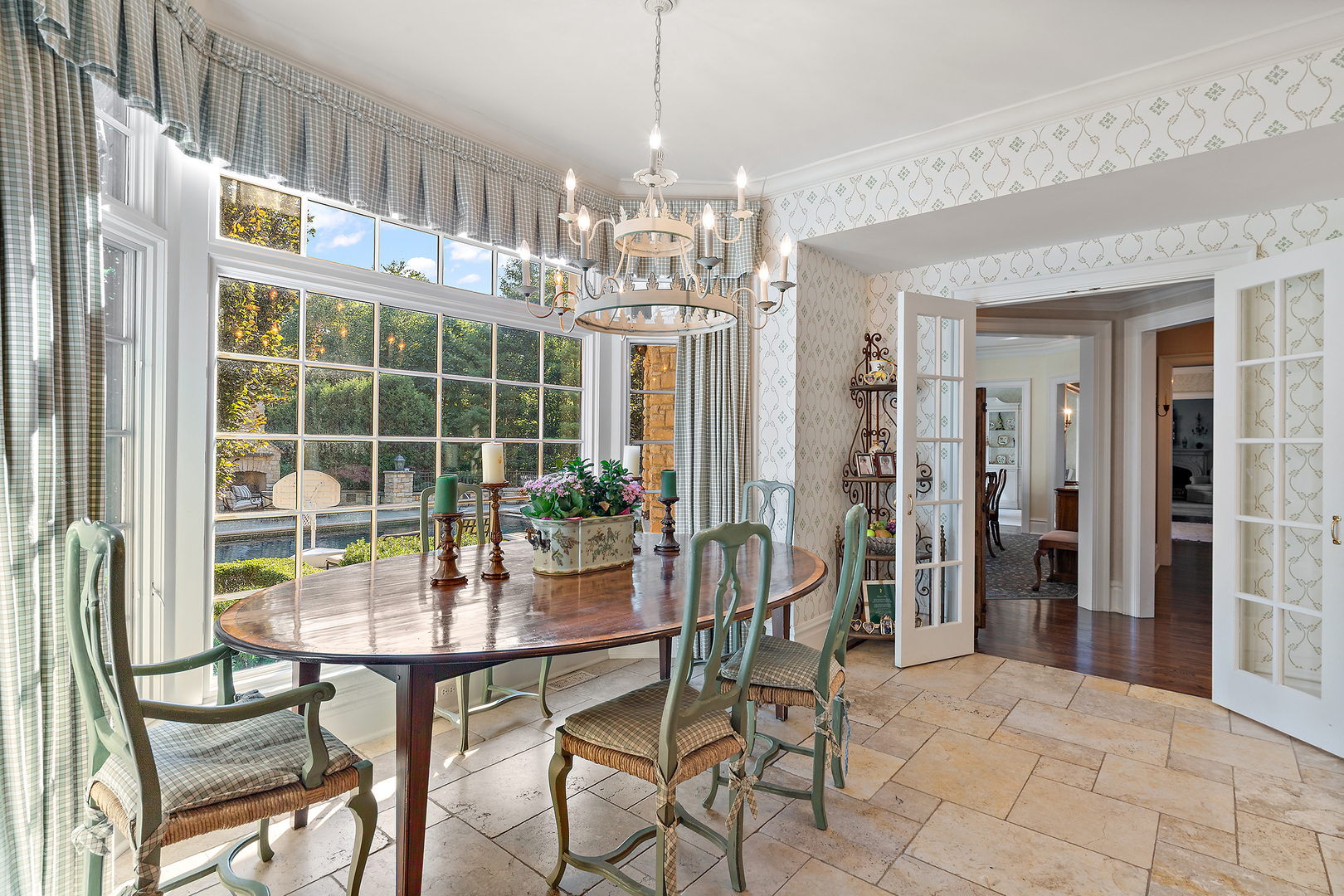 640 Hill Road Winnetka, IL 60093 - Photo 13 of 52 a view of a dining room with furniture and chandelier