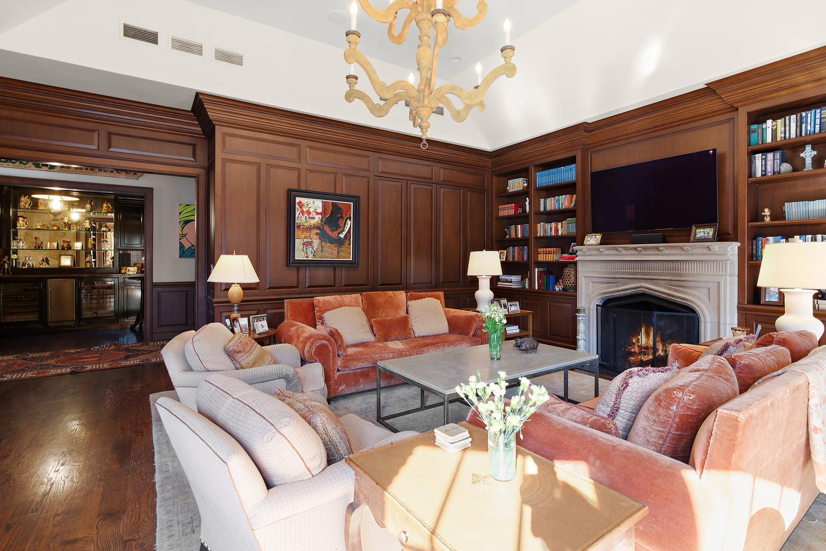640 Hill Road Winnetka, IL 60093 - Photo 17 of 52 a living room with furniture a flat screen tv and a fireplace