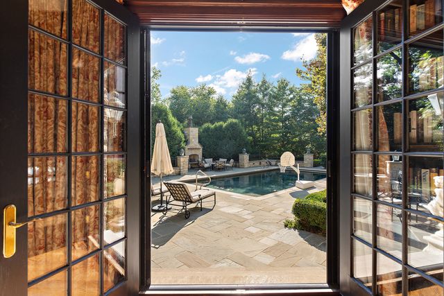 a view of a living room and floor to ceiling window or lake