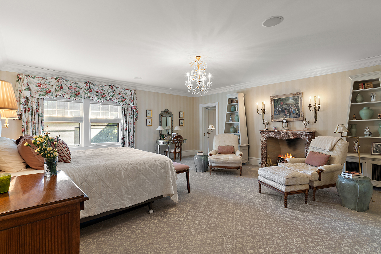 640 Hill Road Winnetka, IL 60093 - Photo 24 of 52 a bedroom with a bed and large windows