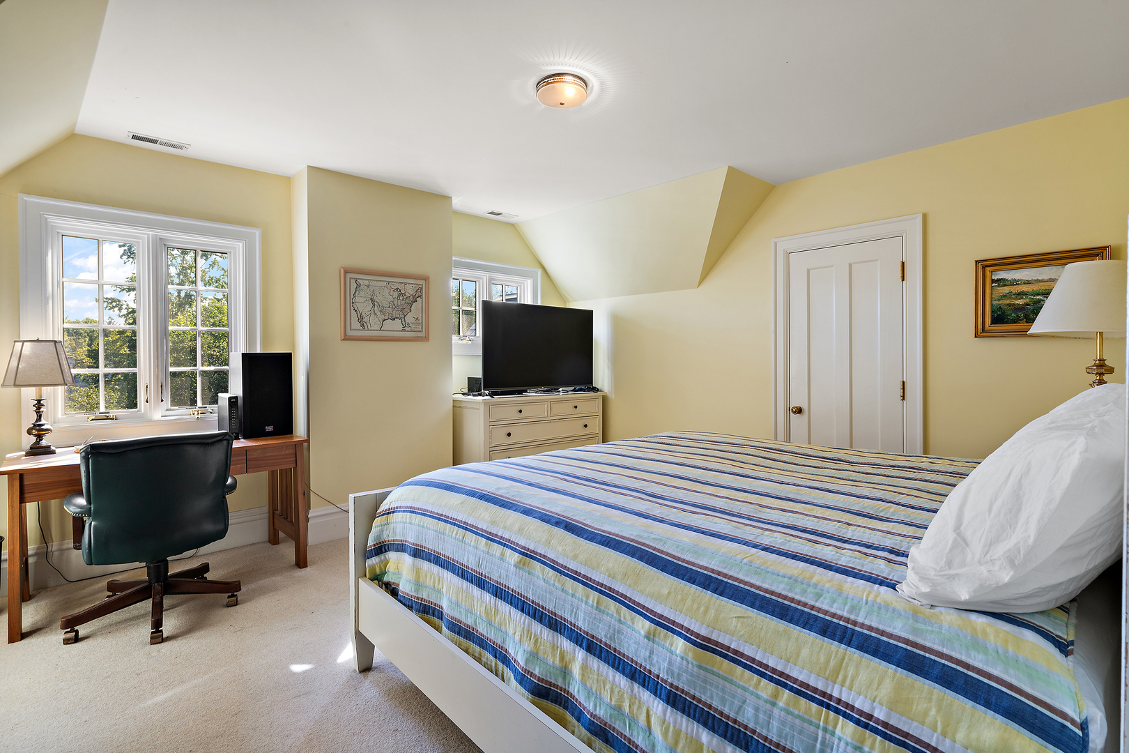 640 Hill Road Winnetka, IL 60093 - Photo 33 of 52 a bedroom with a bed and a flat screen tv