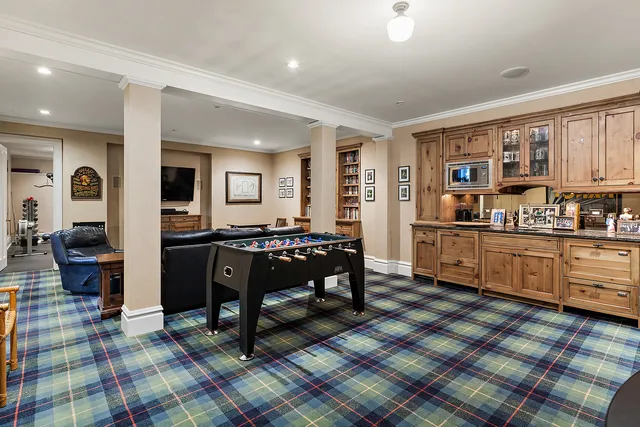 a dining room with furniture and window
