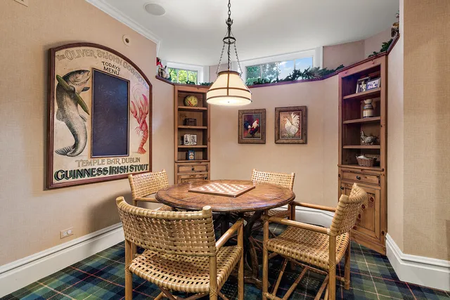 a view of a dining room with furniture window and outside view