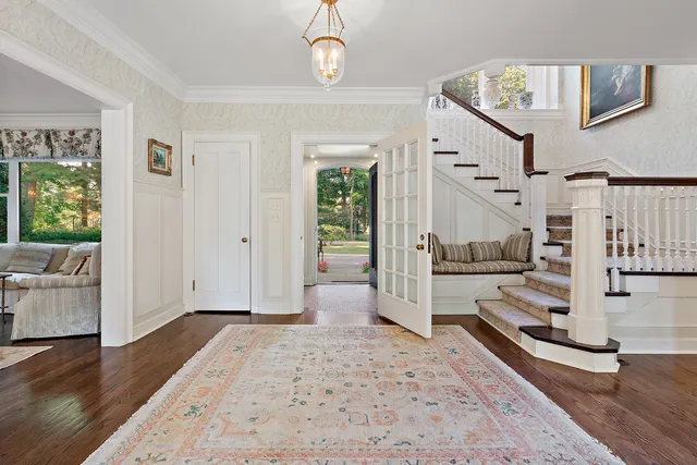 a view of a livingroom with furniture and a window