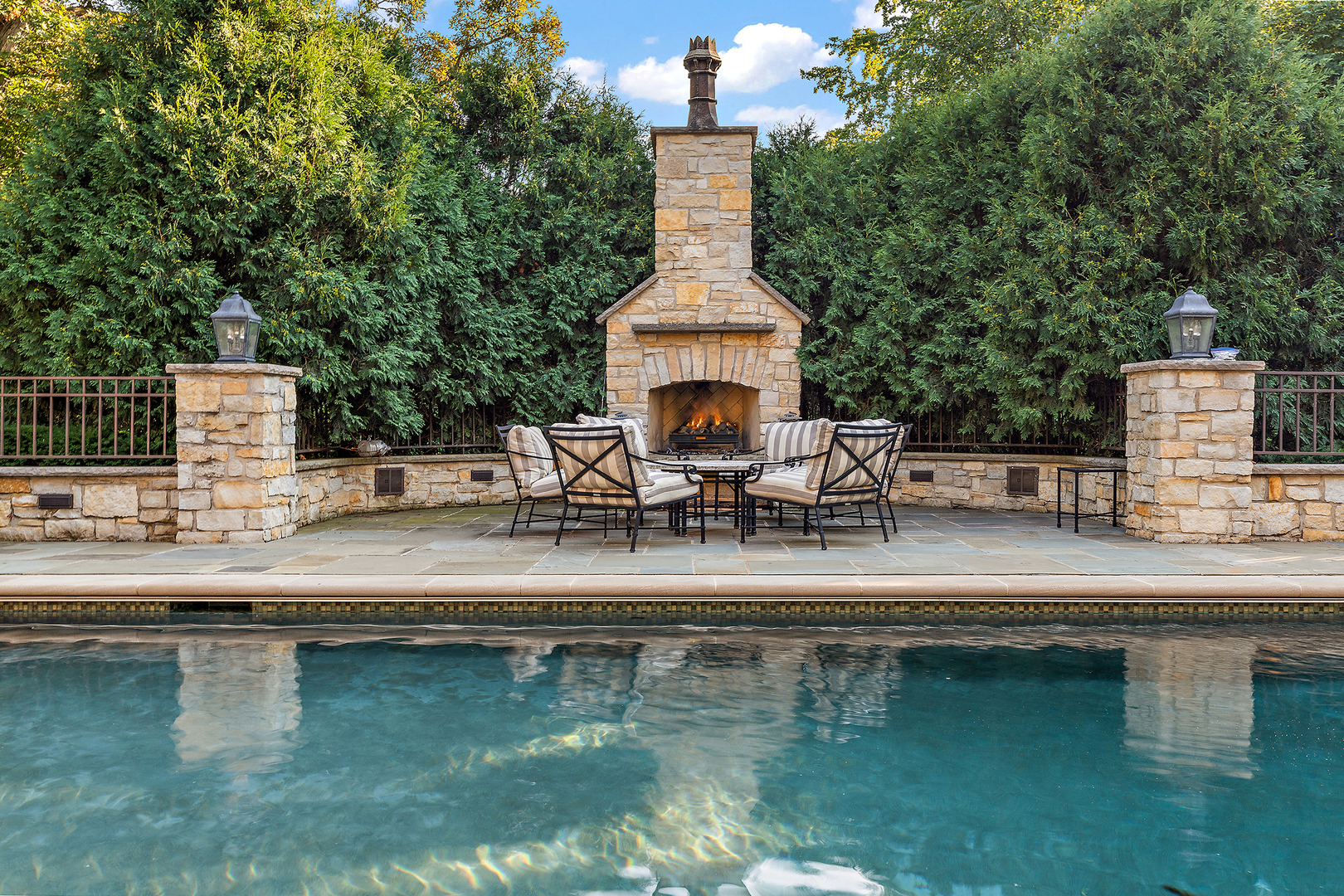 640 Hill Road Winnetka, IL 60093 - Photo 42 of 52 a view of swimming pool with outdoor seating yard and barbeque oven