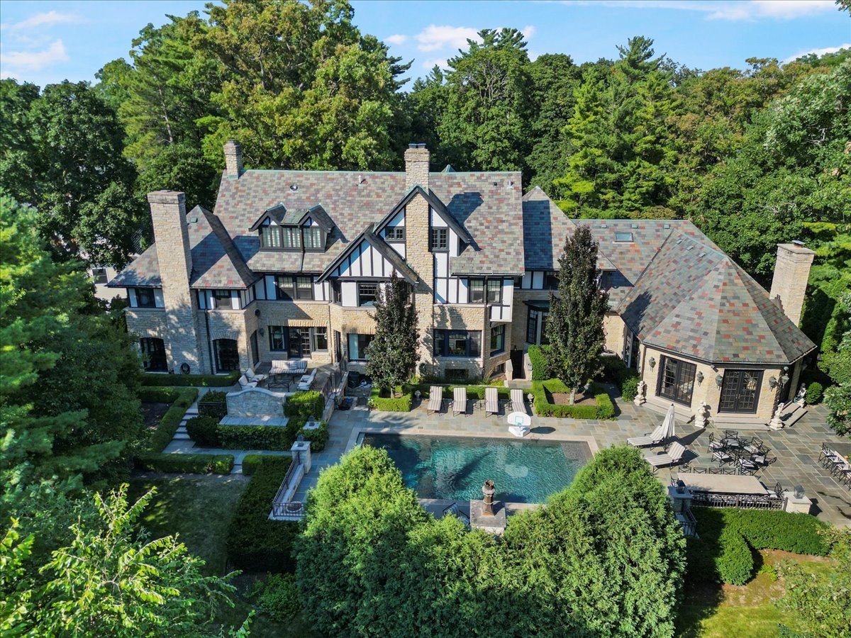 640 Hill Road Winnetka, IL 60093 - Photo 49 of 52 an aerial view of a house with a garden and lake view