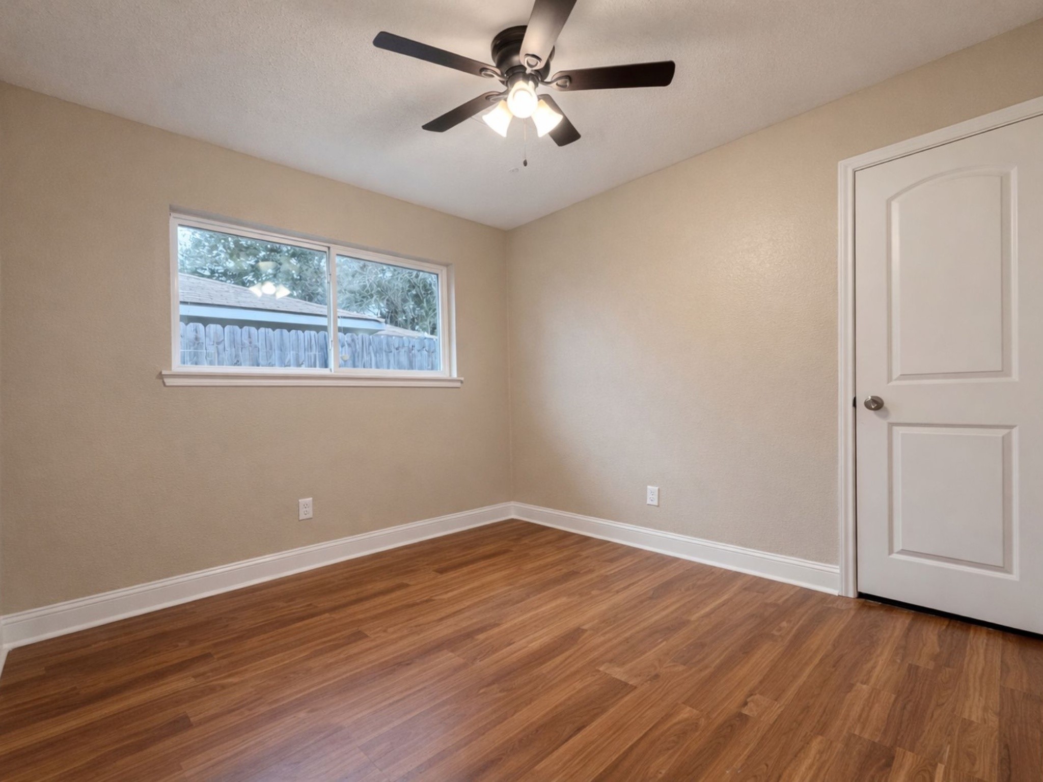 1318 Epsilon Street Pasadena, TX 77504 - Photo 8 of 15 a view of empty room with wooden floor