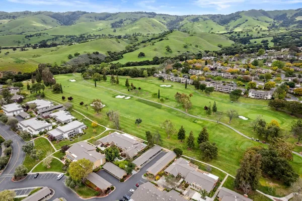 a view of an outdoor space and tennis court