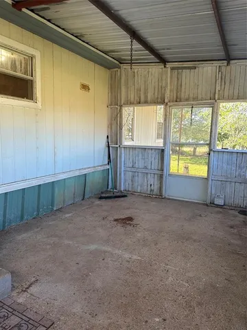 a view of outdoor space and wooden deck