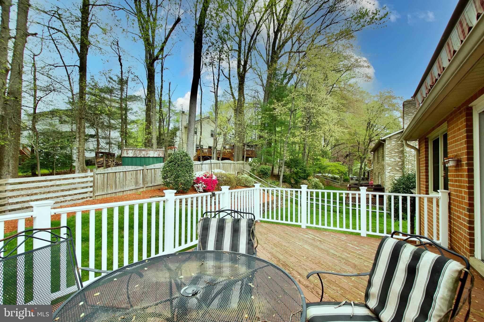 6690 Old Blacksmith Drive Burke, VA 22015 - Photo 30 of 46 a view of a chair and tables