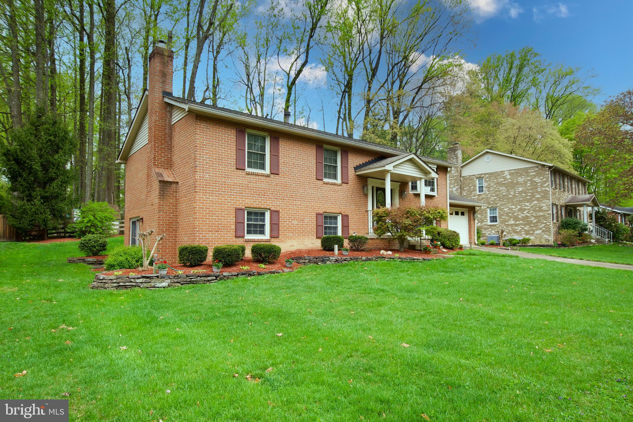 6690 Old Blacksmith Drive Burke, VA 22015 - Photo 3 of 46 a view of a house with backyard