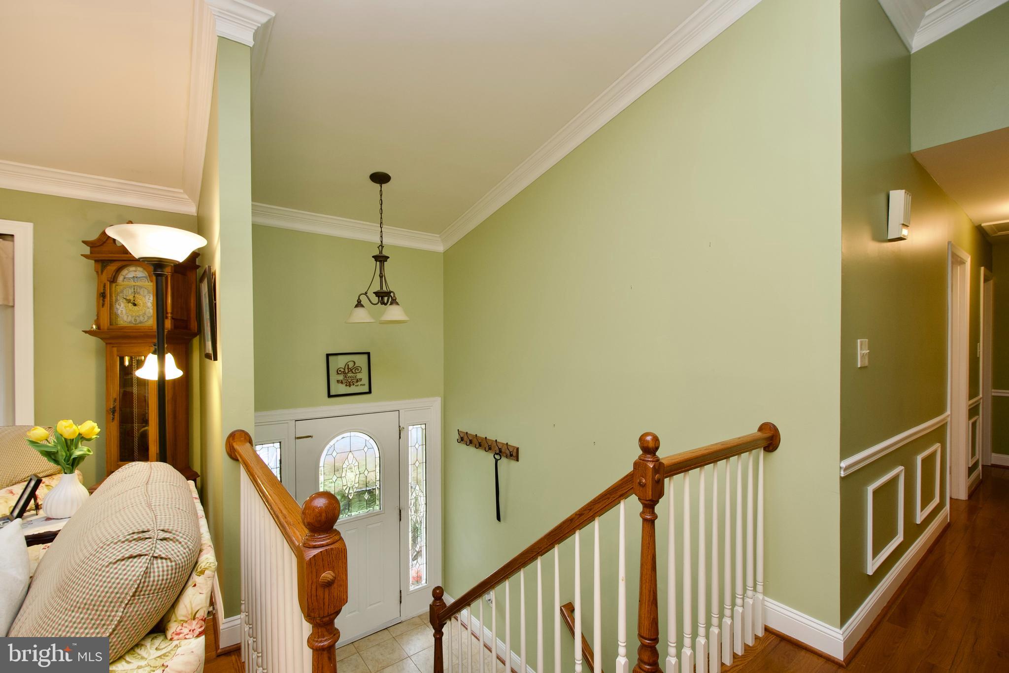 6690 Old Blacksmith Drive Burke, VA 22015 - Photo 5 of 46 a view of a balcony with wooden floor