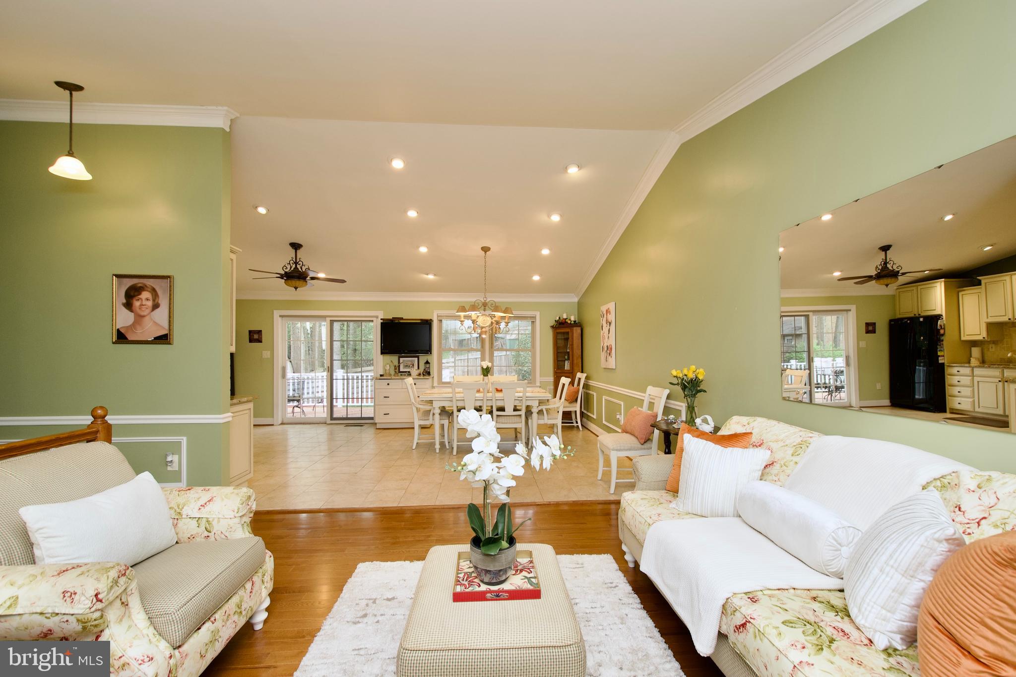 6690 Old Blacksmith Drive Burke, VA 22015 - Photo 9 of 46 a living room with furniture and a wooden floor