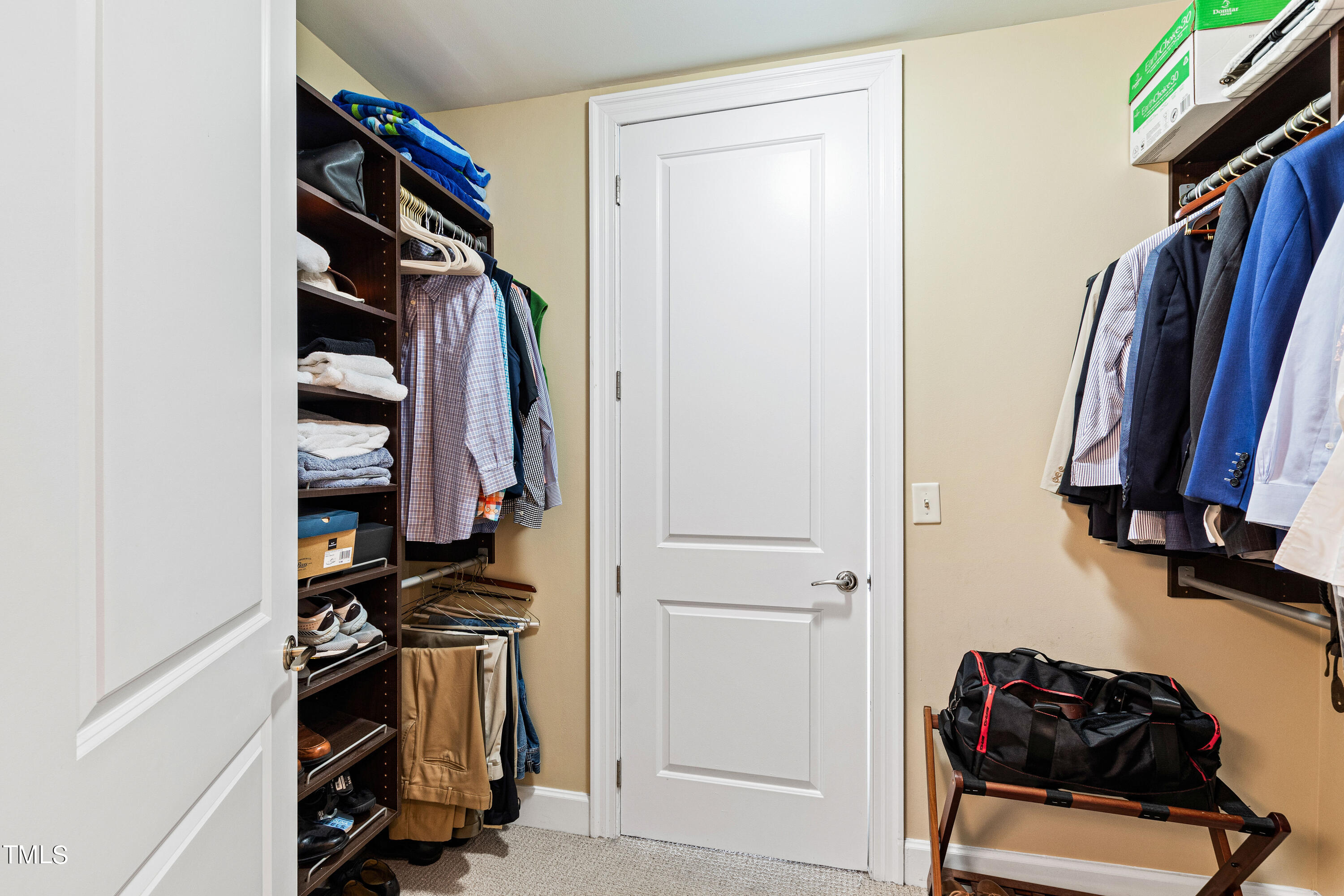 301 Fayetteville Street, Unit 3305 Raleigh, NC 27601 - Photo 35 of 80 a view of walk in closet with clothes and shoes