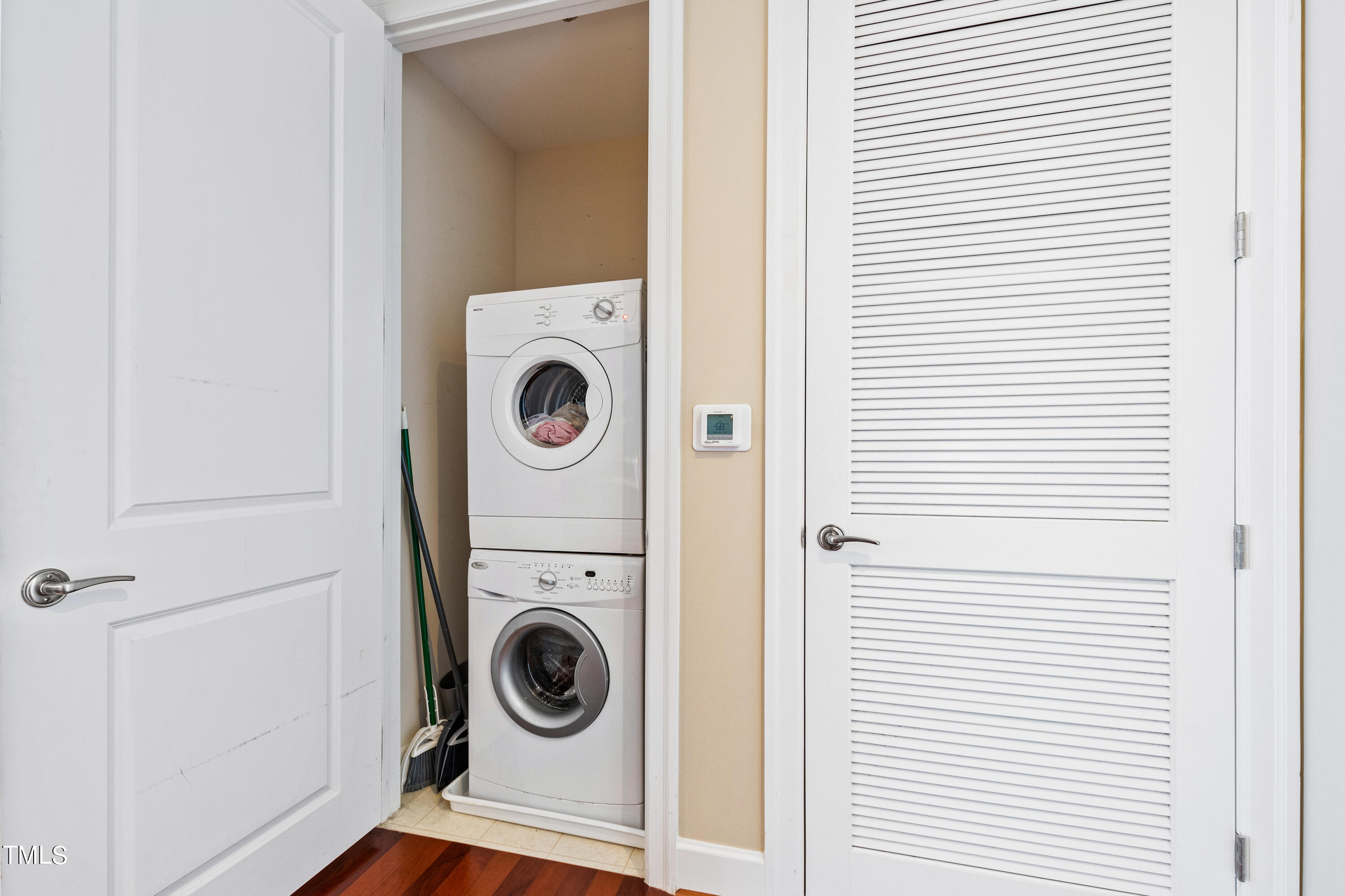 301 Fayetteville Street, Unit 3305 Raleigh, NC 27601 - Photo 40 of 80 a utility room with dryer and washer