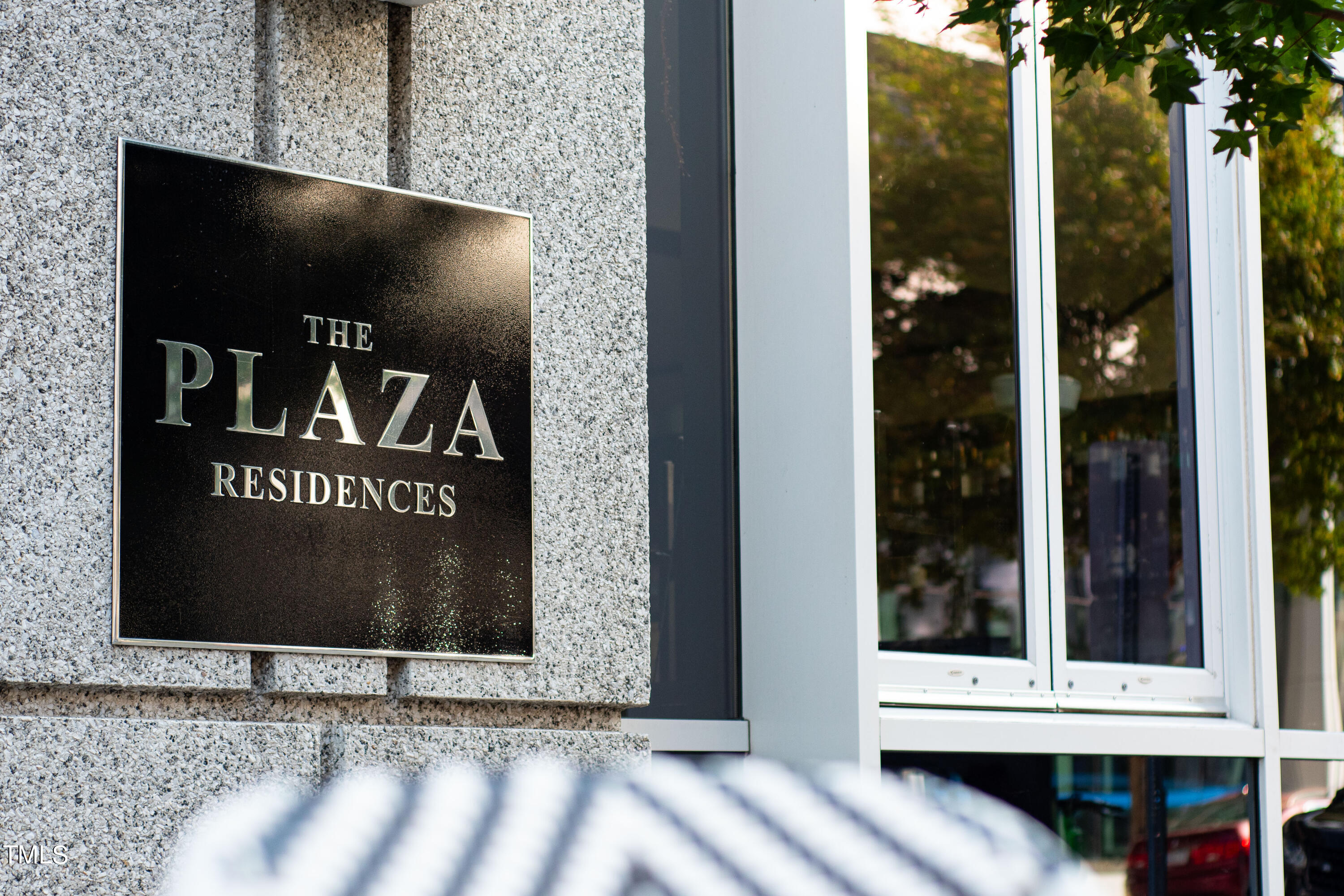 301 Fayetteville Street, Unit 3305 Raleigh, NC 27601 - Photo 70 of 80 a view of a door with a sign on the wall
