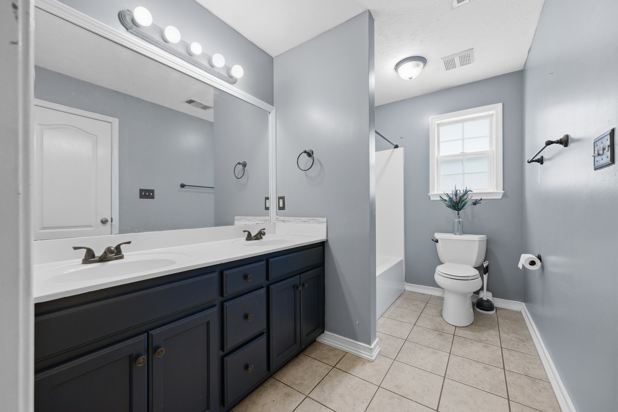 270 Reed Circle Medina, TN 38355 - Photo 19 of 30 a bathroom with a double vanity sink mirror and toilet