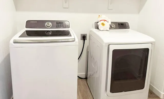 a utility room with dryer and washer