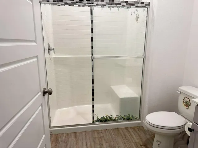a bathroom with a sink and toilet