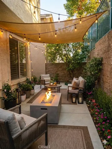 a outdoor living space with furniture and garden view