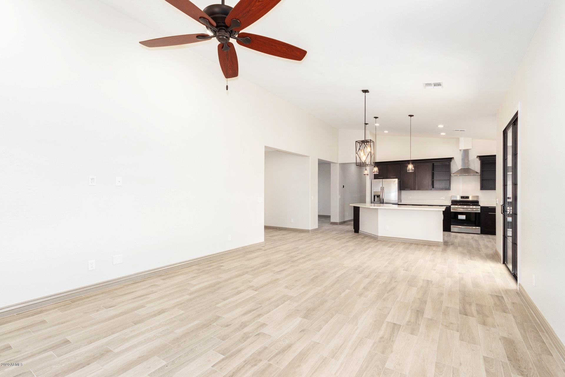 925 West Gregory Road Phoenix, AZ 85041 - Photo 5 of 37 Great Room, Dining Area, Kitchen View A