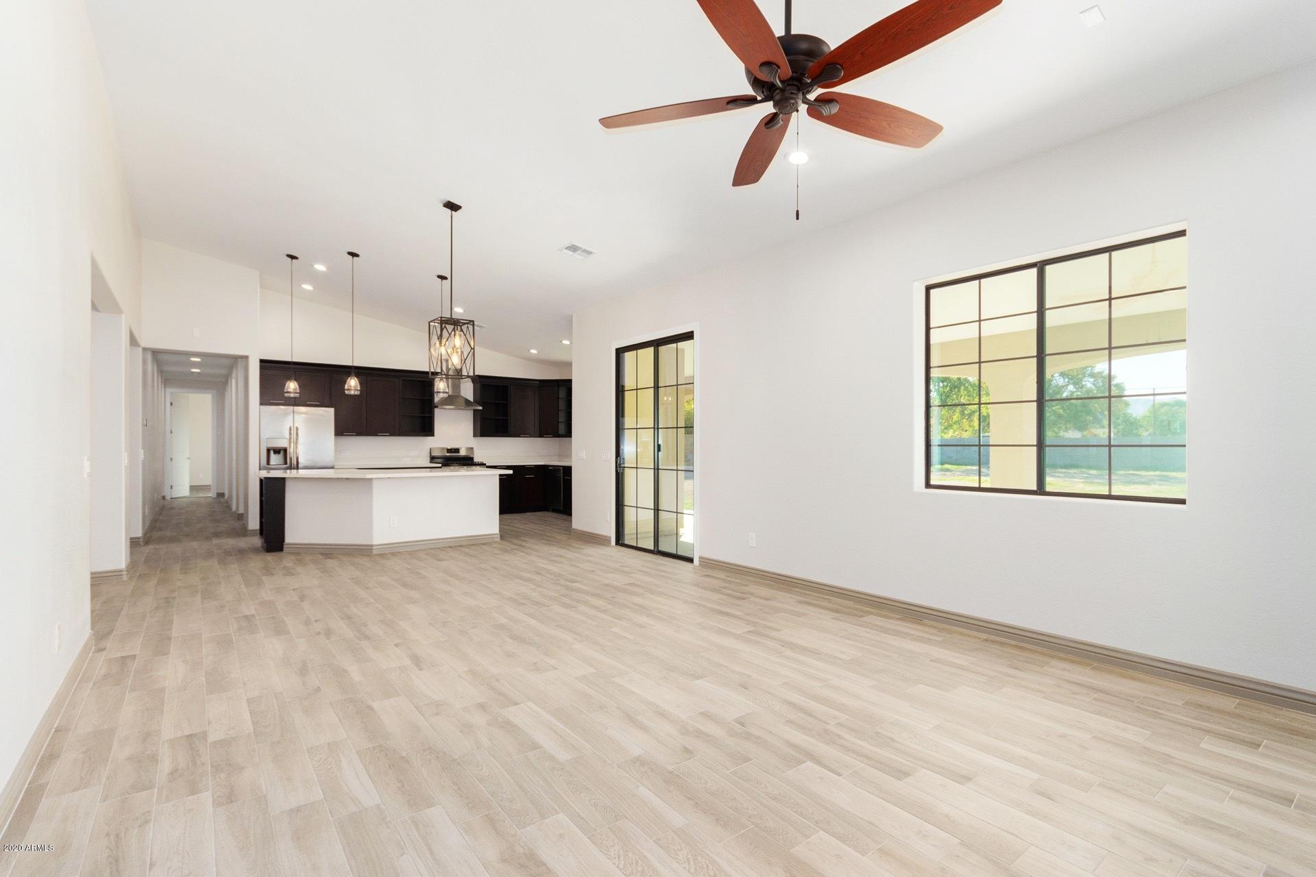 925 West Gregory Road Phoenix, AZ 85041 - Photo 6 of 37 Great Room, Dining Area, Kitchen View B