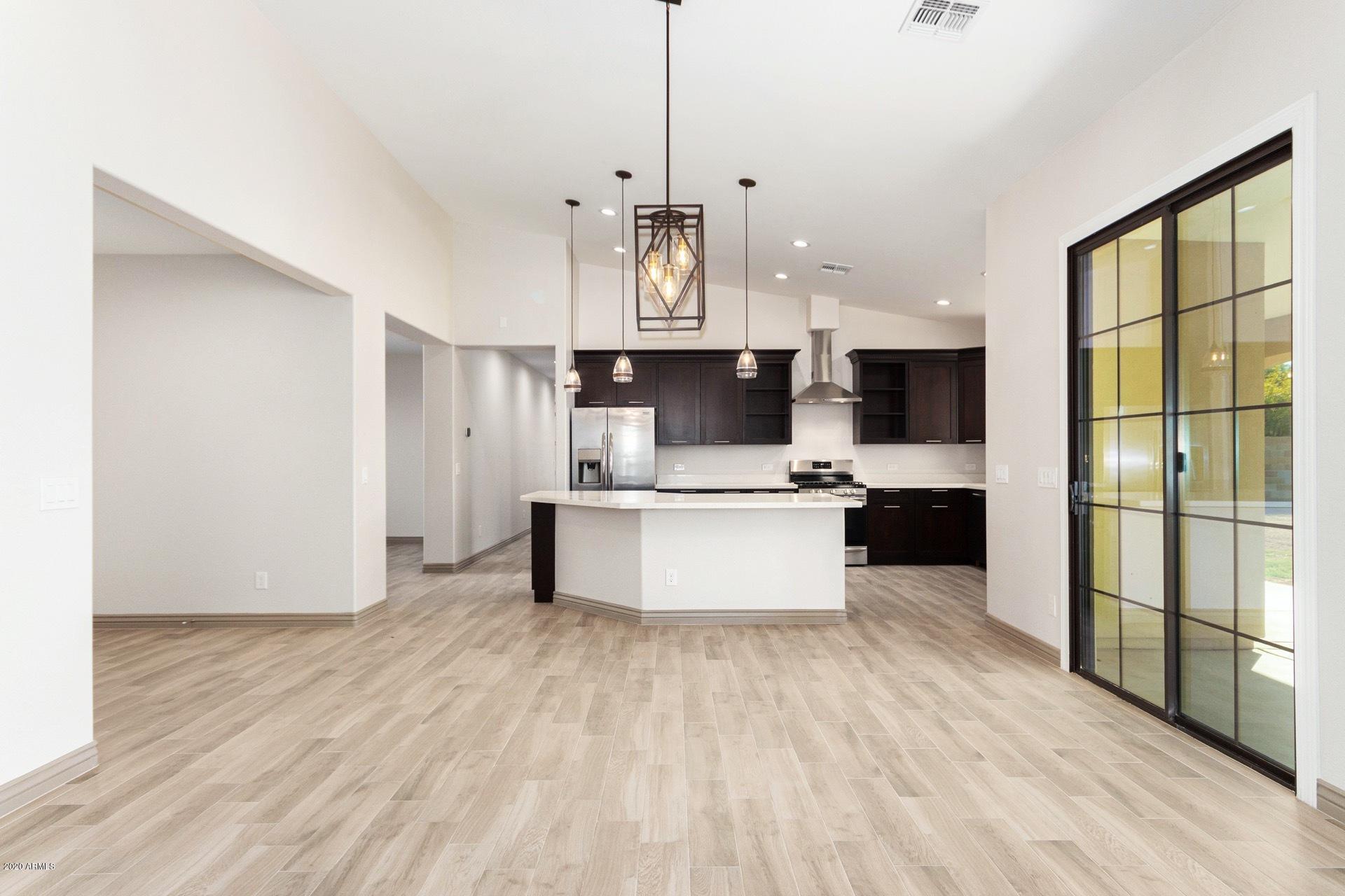 925 West Gregory Road Phoenix, AZ 85041 - Photo 7 of 37 Great Room, Dining Area, Kitchen View C