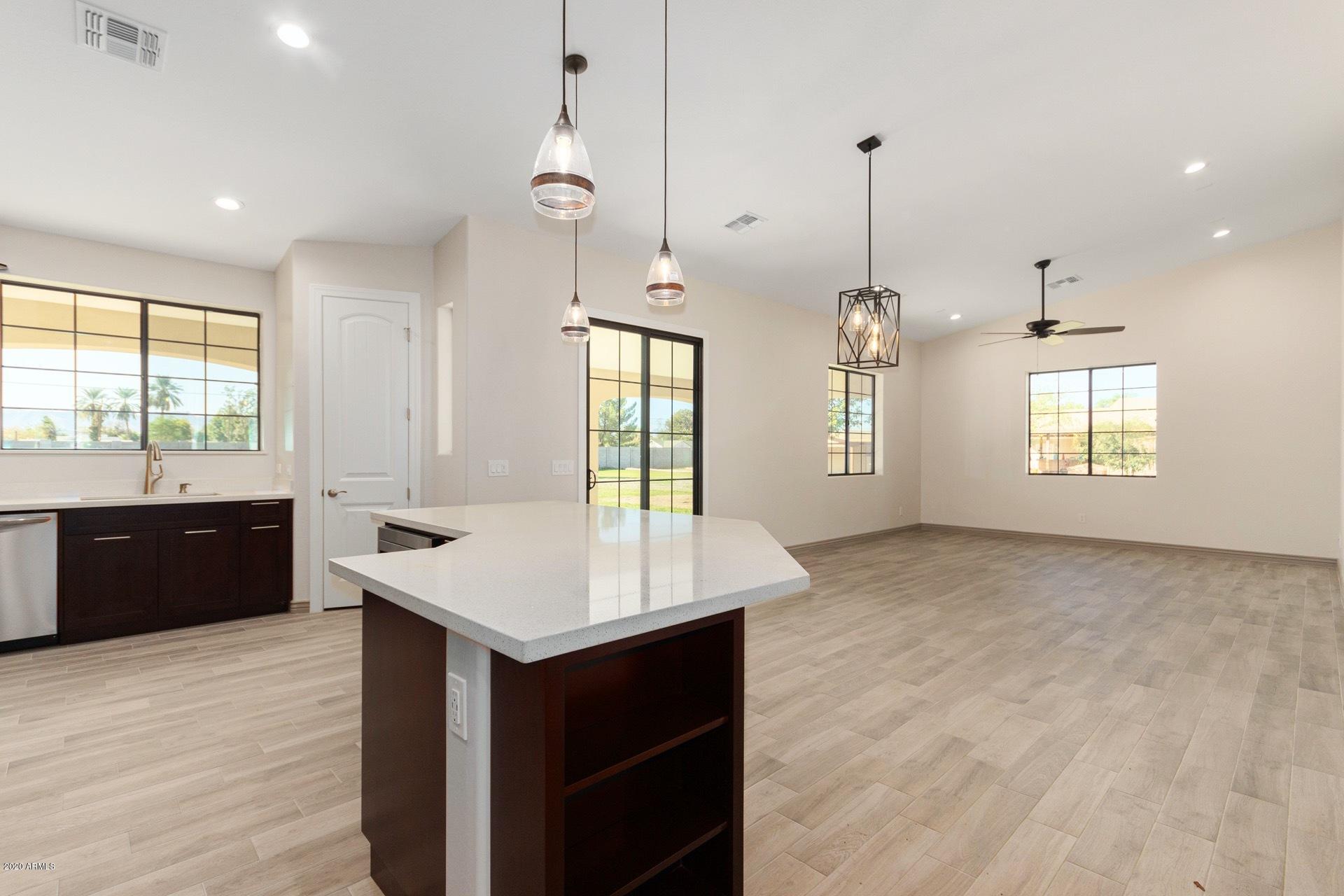 925 West Gregory Road Phoenix, AZ 85041 - Photo 8 of 37 Great Room, Dining Area, Kitchen View D