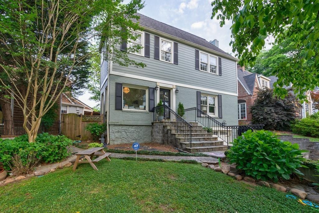 2724 Atwood Road Northeast Atlanta, GA 30305 - Photo 19 of 22 a front view of a house with a garden