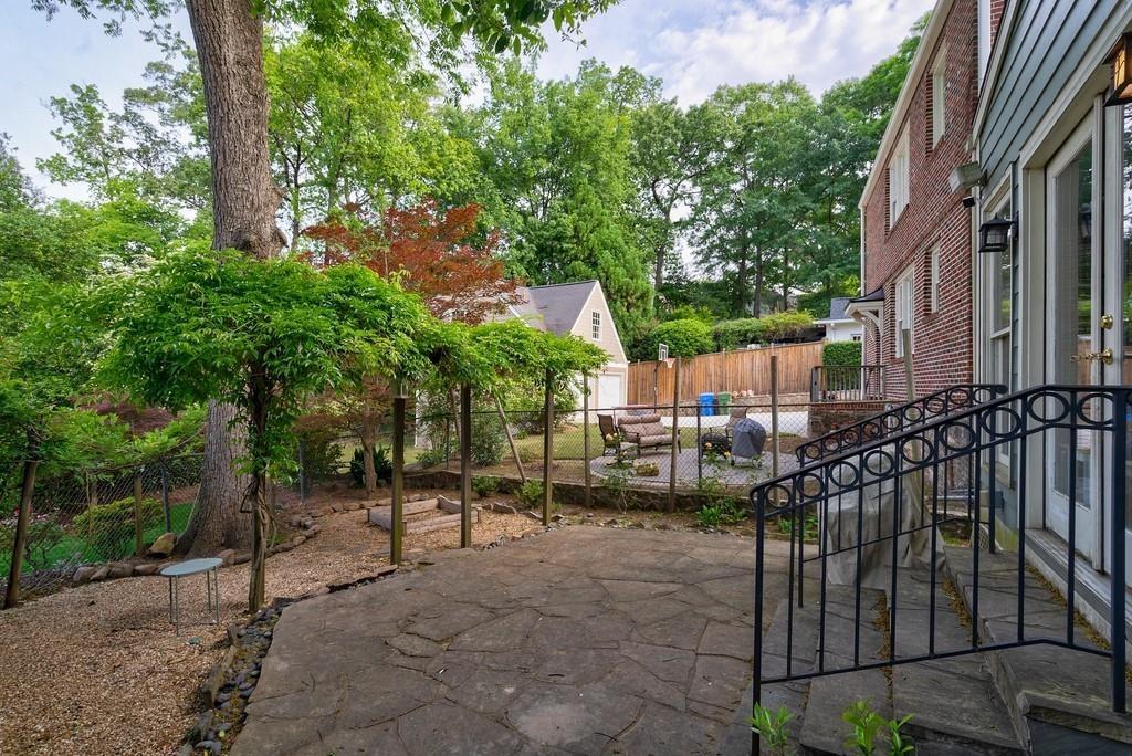 2724 Atwood Road Northeast Atlanta, GA 30305 - Photo 20 of 22 a view of a bench in backyard of house