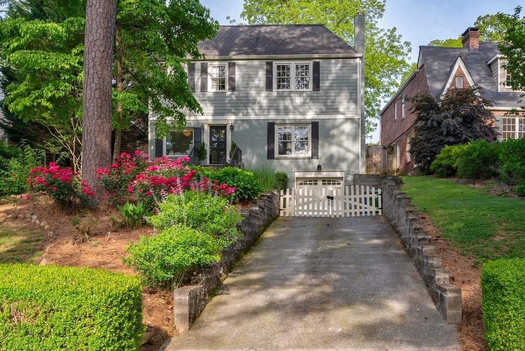 2724 Atwood Road Northeast Atlanta, GA 30305 - Photo 22 of 22 a front view of a house with a garden