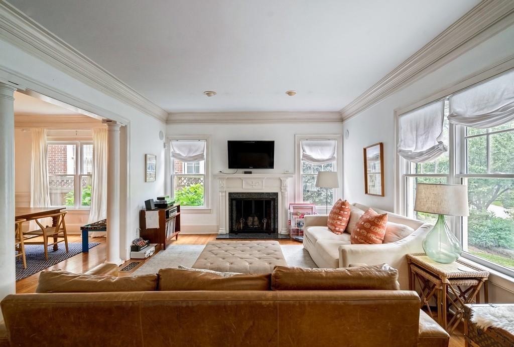 2724 Atwood Road Northeast Atlanta, GA 30305 - Photo 4 of 22 a living room with furniture a fireplace and a large window