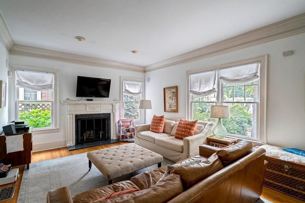 2724 Atwood Road Northeast Atlanta, GA 30305 - Photo 5 of 22 a living room with furniture and a fireplace
