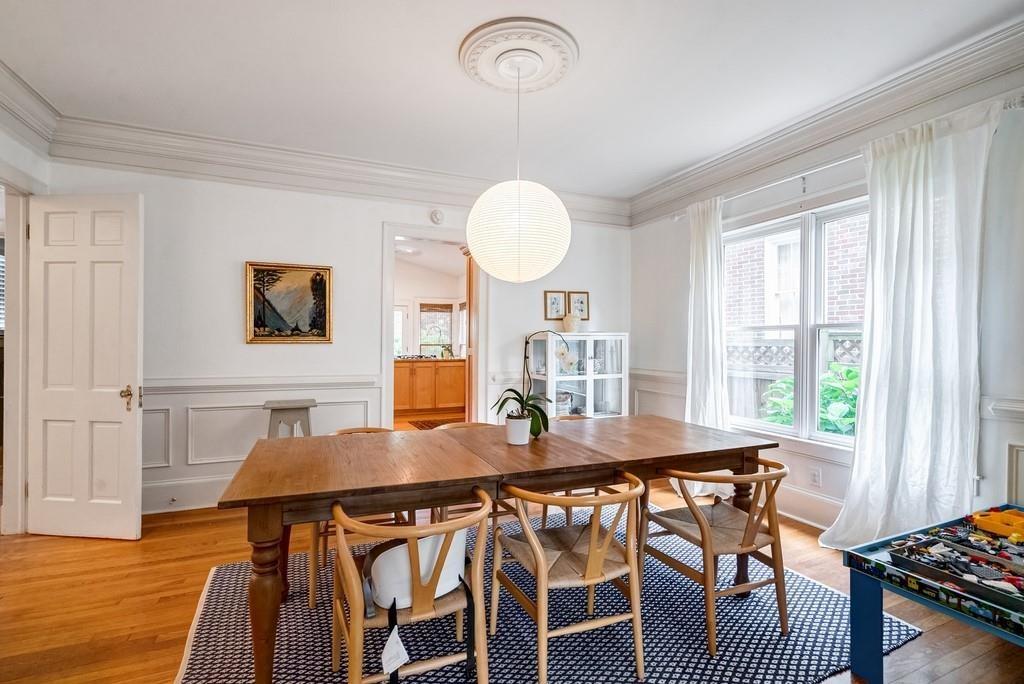 2724 Atwood Road Northeast Atlanta, GA 30305 - Photo 7 of 22 a view of a dining room with furniture window and wooden floor