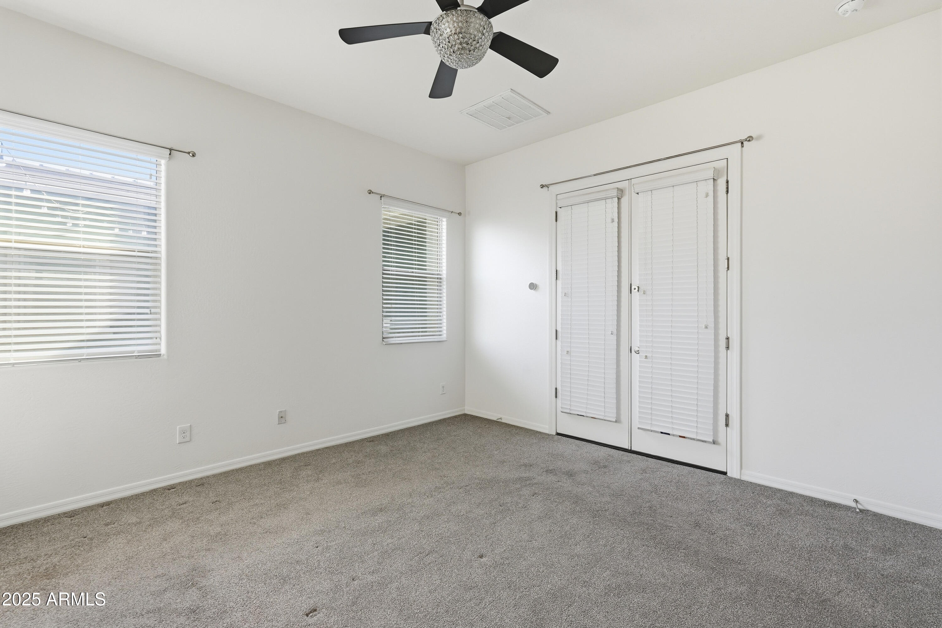 1432 East Pedro Road Phoenix, AZ 85042 - Photo 35 of 52 a view of an empty room with a window