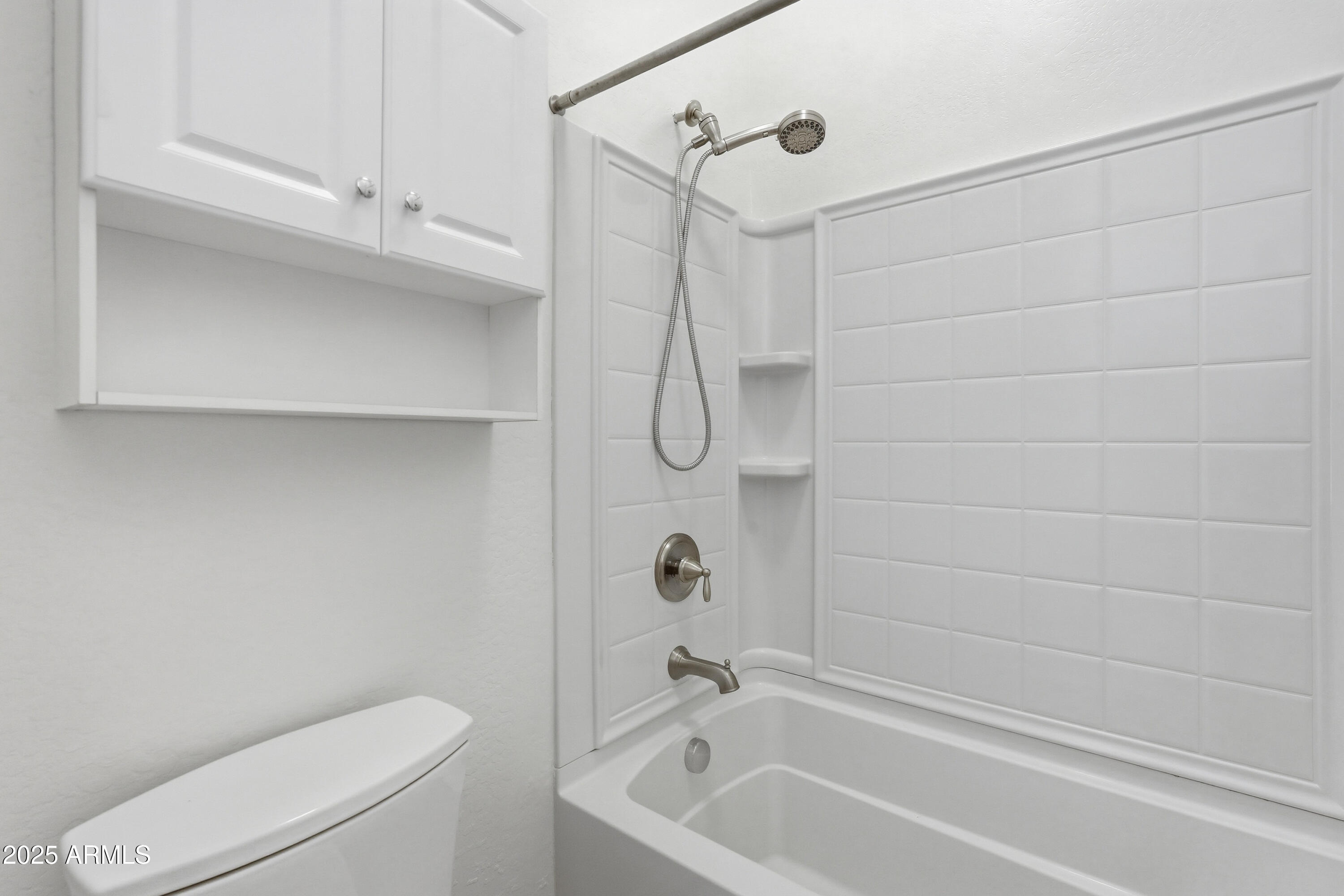 1432 East Pedro Road Phoenix, AZ 85042 - Photo 37 of 52 a bathroom with a toilet and a shower