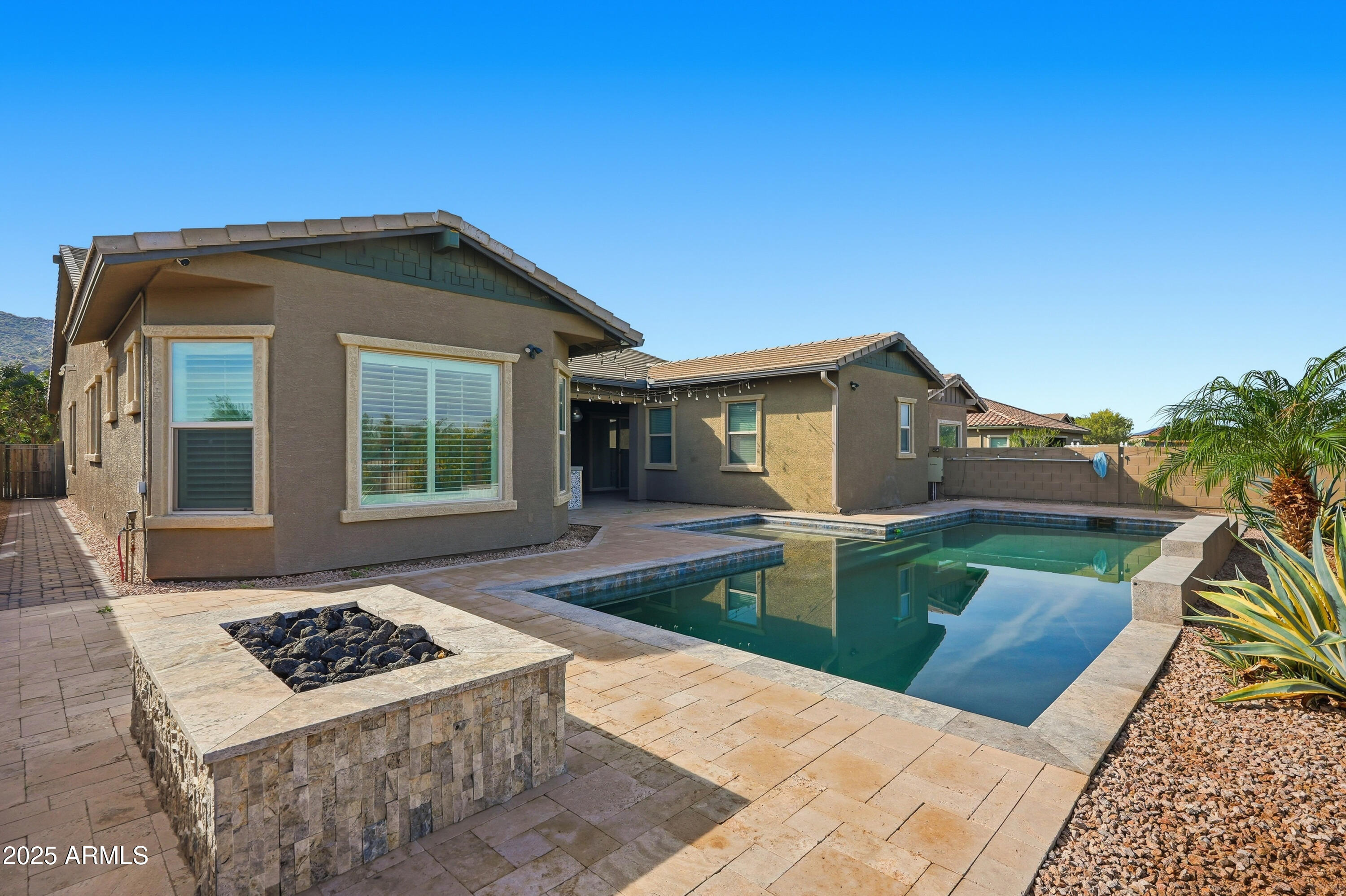 1432 East Pedro Road Phoenix, AZ 85042 - Photo 43 of 52 a front view of a house with a yard