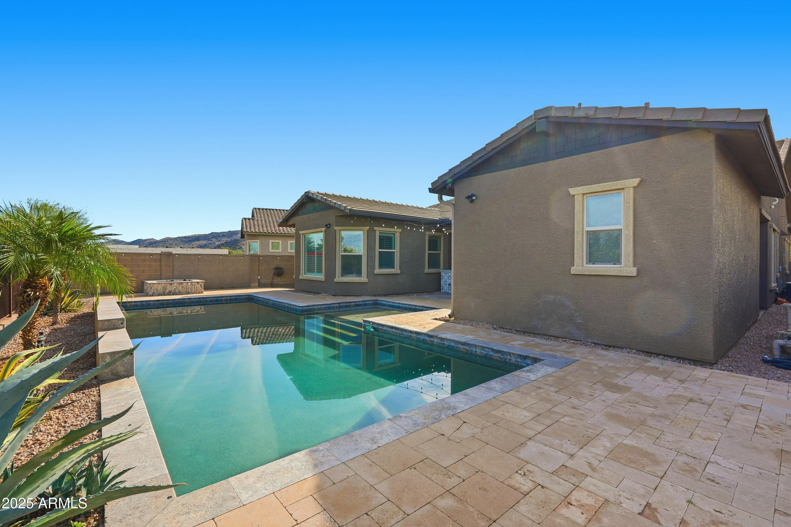 1432 East Pedro Road Phoenix, AZ 85042 - Photo 45 of 52 a view of a house with a swimming pool